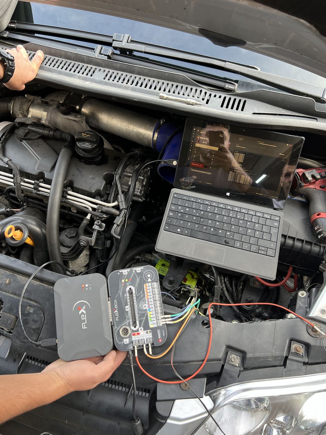 Volkswagen TDI engine bay with Flex box and tablet connected
